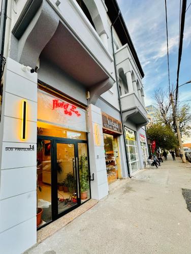 a store front of a store on a street at Hotel EOS in Bucharest