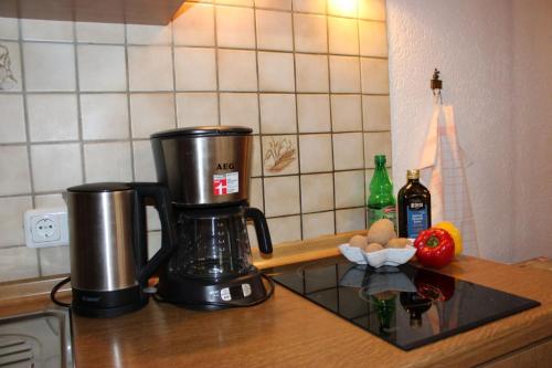 a coffee maker on a counter in a kitchen at Bernerhof Ferienwohnungen Schmuck in Teisendorf