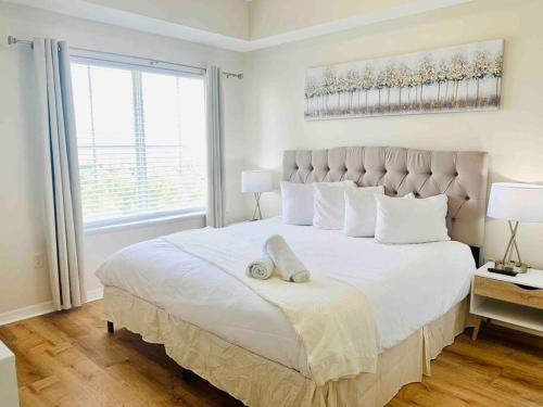 Postel nebo postele na pokoji v ubytování Walking Distance from Universal One Bedroom Resort