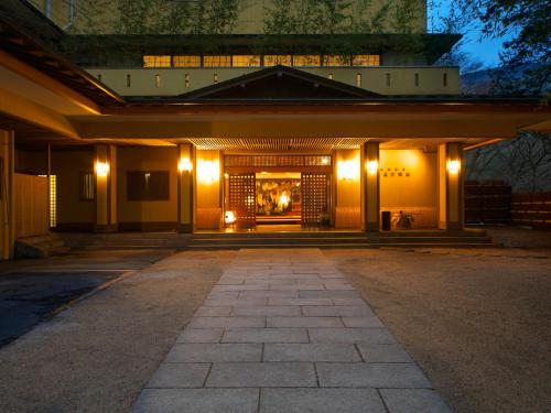 a building with lights on it at night at Musashino Bekkan in Hakone