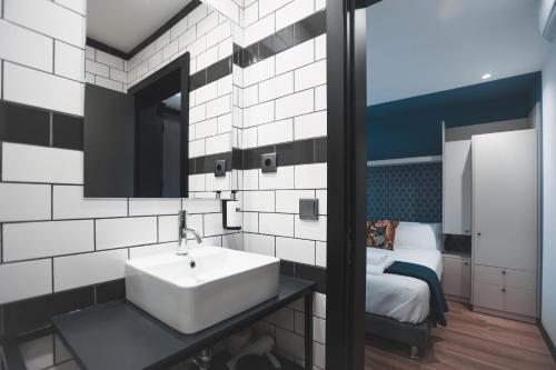 Postel nebo postele na pokoji v ubytování Alma Candida 23