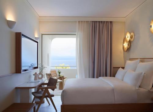 Posteľ alebo postele v izbe v ubytovaní Brown Beach Chalkida Kosher Resort, a member of Brown Hotels