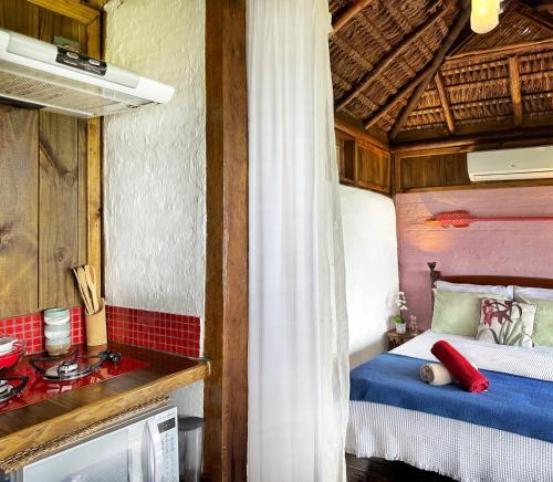 Postel nebo postele na pokoji v ubytování Casas D'Água Doce - Casa Ateliê