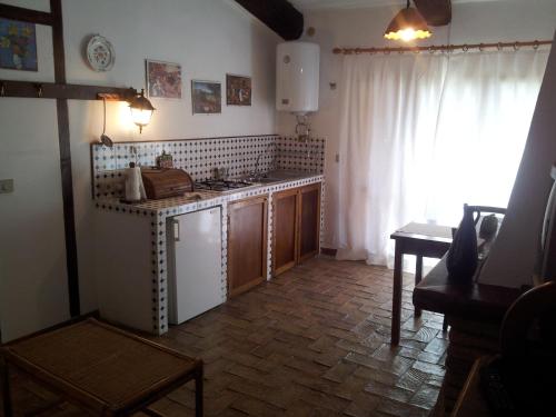 Una cocina o zona de cocina en Podere Conte Ràcani