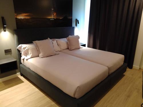 Кровать или кровати в номере El Cielo de Muriel mejor Hotel Starlight del mundo Astroturismo y Naturaleza