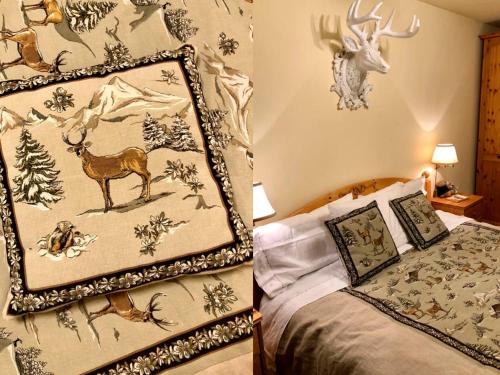 ズルレイにあるApartment Residenza Chesa Margun 14-5 by Interhomeのベッドルーム1室(ベッド1台、毛布、鹿付)