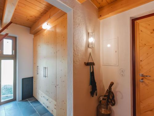 a hallway with a walk in shower in a house at Apartment Hajenuis TOP OG by Interhome in Königsleiten