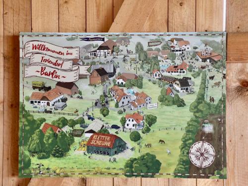 a model of a village with a sign on it at Apartment Vilm by Interhome in Dargun
