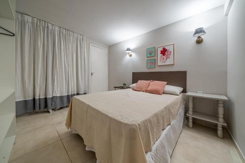 Krevet ili kreveti u jedinici u okviru objekta 275 - Apartamento 01 dormitório na Praia de Mariscal