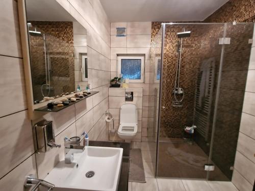 Ett badrum på Villa Djokovic