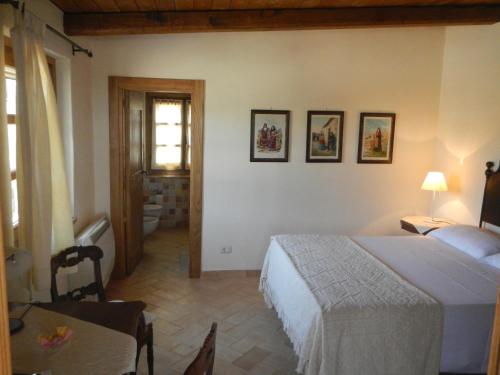 Postel nebo postele na pokoji v ubytování Monte Atena B&B di Charme