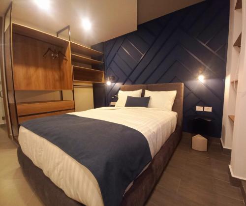 Ένα ή περισσότερα κρεβάτια σε δωμάτιο στο Missum Versatile Living
