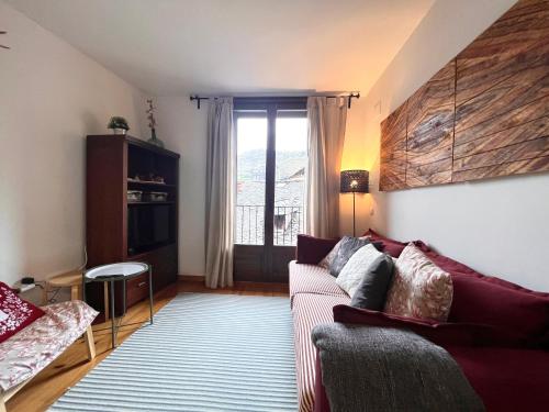 Ένα ή περισσότερα κρεβάτια σε δωμάτιο στο Apartaments del Camp - L'Amfitriona