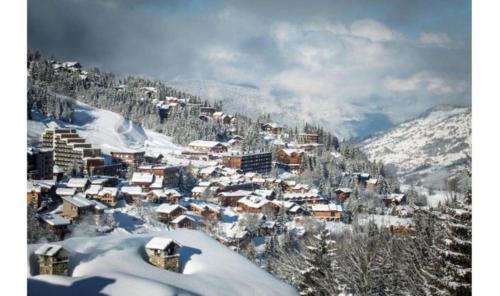 Το Résidence Le Domaine du Jardin Alpin - Courchevel 1850 τον χειμώνα