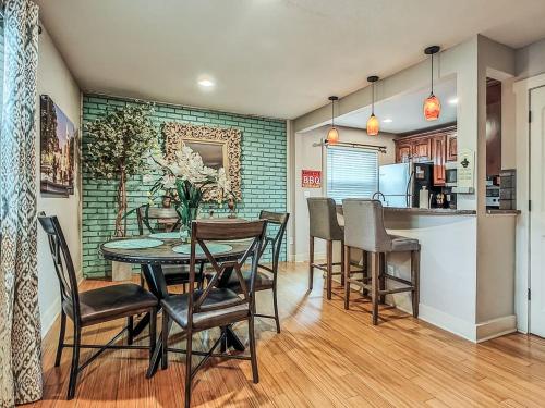 a kitchen and dining room with a table and chairs at Quiet Plaza Two bedroom 2 Bathroom in Kansas City