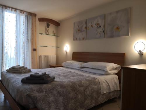 Postel nebo postele na pokoji v ubytování Casetta a Monte Sant'á