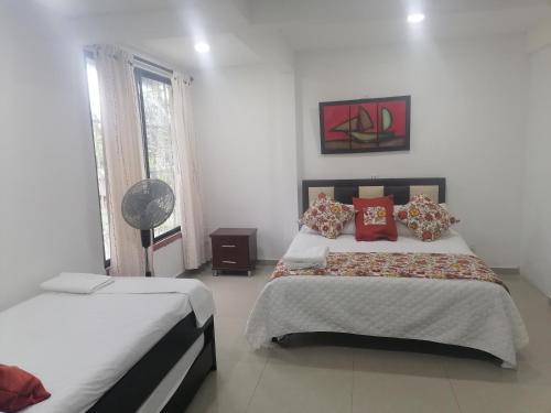 Postel nebo postele na pokoji v ubytování Apartamento Campestre Pereira