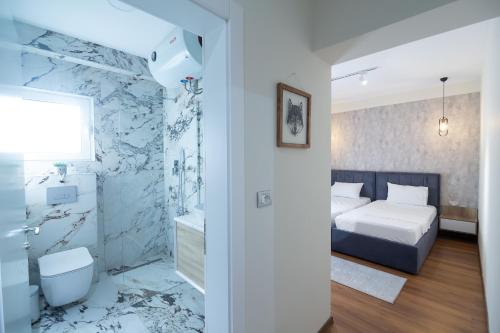 Ένα ή περισσότερα κρεβάτια σε δωμάτιο στο Melnaz Apartament 3