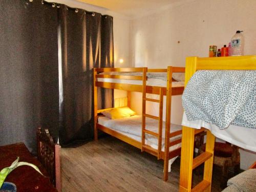a couple of bunk beds in a room at Yard in Amora