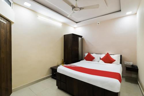 Krevet ili kreveti u jedinici u okviru objekta OYO Flagship Hotel Airport Annex