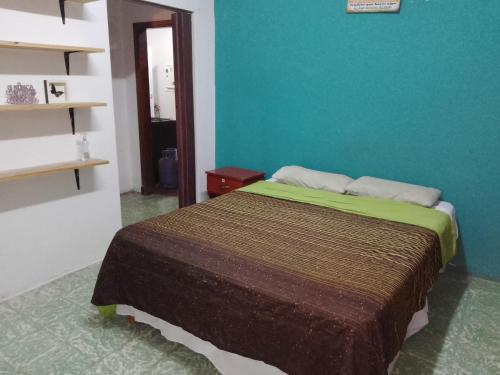 En eller flere senge i et værelse på Mi Viejo