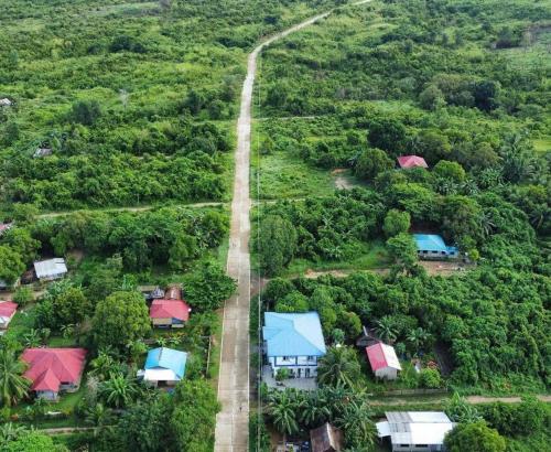 an aerial view of a house in a forest at Charlotte's Vacation Home Busuanga Palawan in Buluang