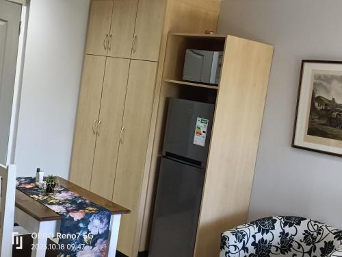 Nhà bếp/bếp nhỏ tại Hill 60 Cottages