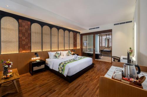 Mokko Suites Batubeligにあるベッド