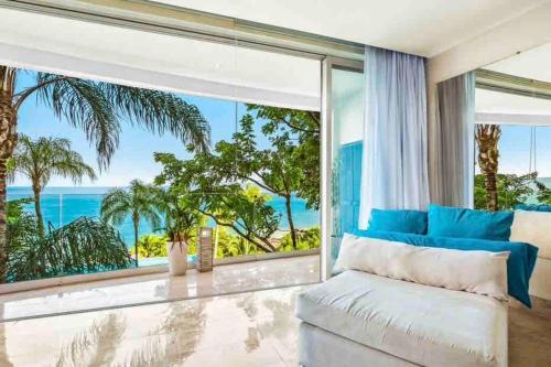 a bedroom with a view of the ocean at Free Transport ~OCEAN VIEWS~ Romantic zone in Puerto Vallarta