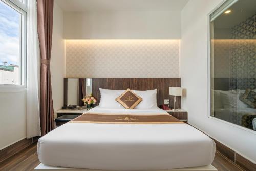 Cama o camas de una habitación en Minh Chien Hotel