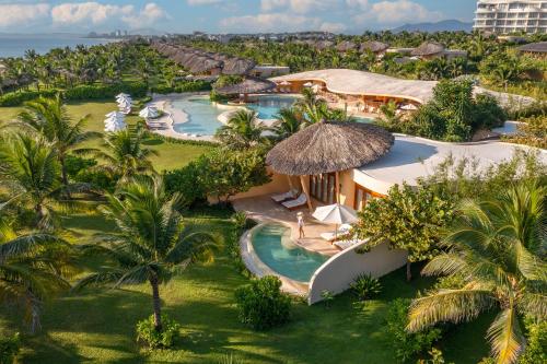 an aerial view of a resort with a swimming pool at Ana Mandara Cam Ranh in Cam Ranh