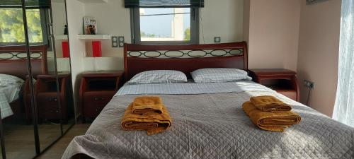 מיטה או מיטות בחדר ב-Villa verde