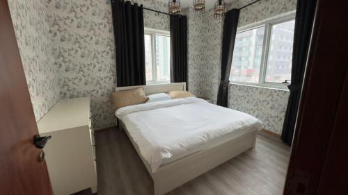 Postel nebo postele na pokoji v ubytování Spacious 2-Bed Marina Apartment