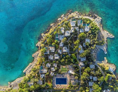 an aerial view of an island in the ocean at Minos Beach Art Hotel, a Member of Design Hotels in Agios Nikolaos