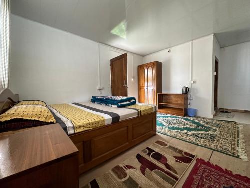 Cama o camas de una habitación en The Tranquil Farm Stay