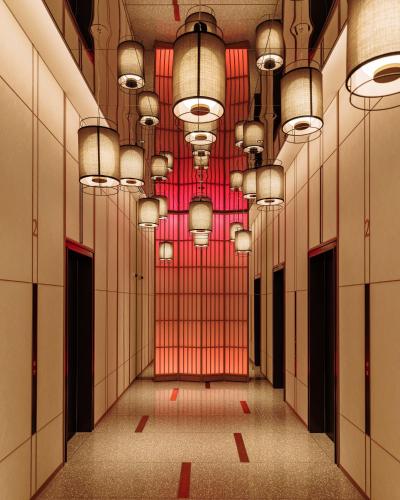 an empty hallway with a bunch of lights at Centara Grand Hotel Osaka in Osaka