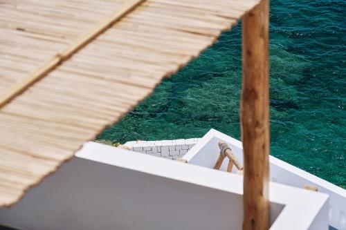 a view of the bow of a boat in the water at Chrysalis Boutique - Adults Only in Astypalaia Town
