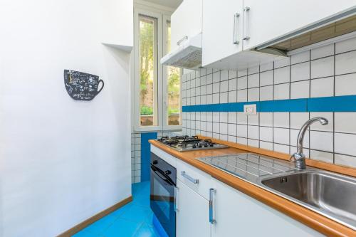 San Luigi cozy flat - private parking