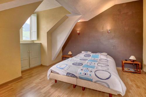 Postel nebo postele na pokoji v ubytování Au Nid Du Gypaéte Oiseau Local