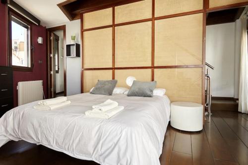 Кровать или кровати в номере Casa del Álamo