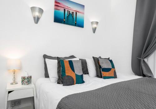 Ένα ή περισσότερα κρεβάτια σε δωμάτιο στο Elmbank Apartment by Klass Living Bellshill
