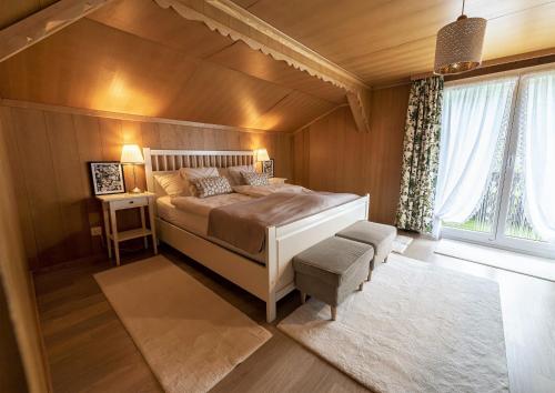 Tempat tidur dalam kamar di Capanna