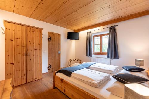 Postel nebo postele na pokoji v ubytování Apartment Samspitze