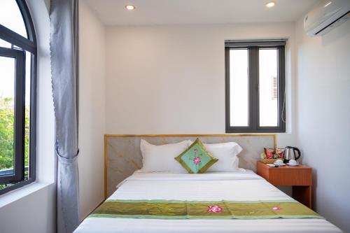 Letto o letti in una camera di Hùng Vỹ Hotel