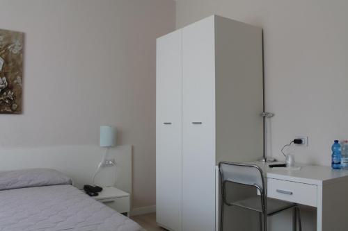 Hotel Cremona Vialeにあるベッド