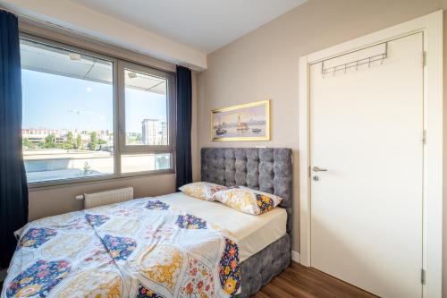 מיטה או מיטות בחדר ב-Luxery Deluxe Topkapı Rezidance