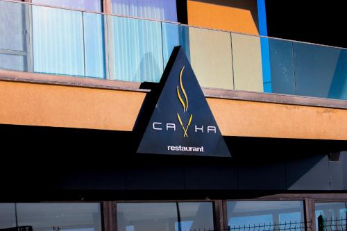a sign on the side of a building at Motel Heksapolis in Tavşancıl