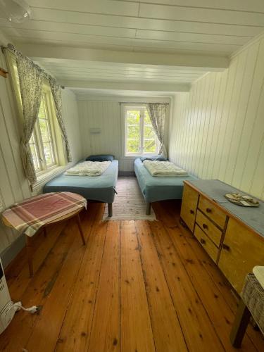 Postel nebo postele na pokoji v ubytování Lofoten Budget Hostel