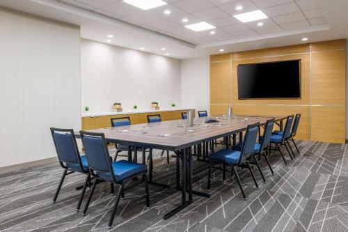 a conference room with a large table and chairs at Hyatt Place San Carlos in San Carlos