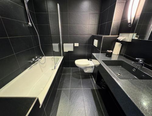Un baño de Hôtel L'Amandier